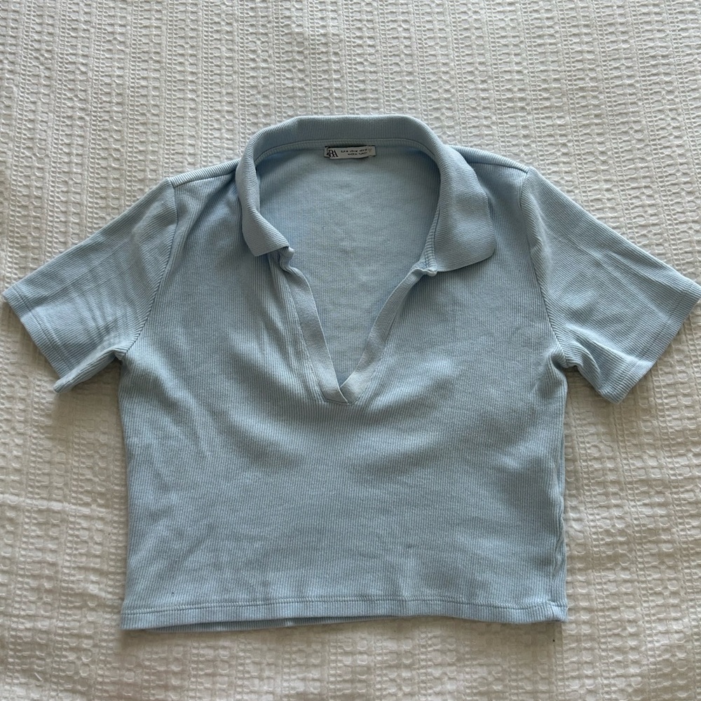 Zara crop top in the colour baby blue and size medium